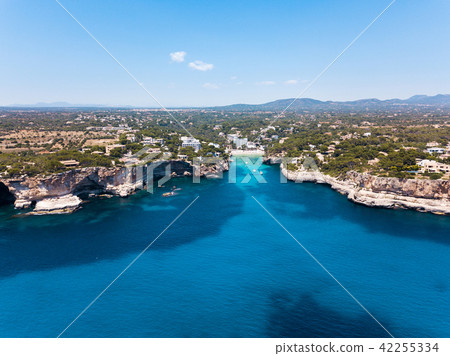 Aerial: Cala Santanyi beach in Mallorca, Spain 42255334