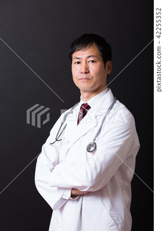 Middle Male in White Coat Middle Male in White Coat 42255352