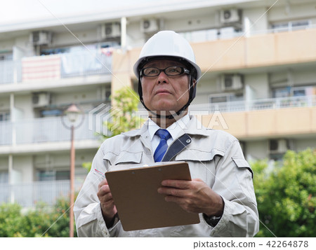 On-site supervision with clipboard On-site supervision with clipboard 42264878