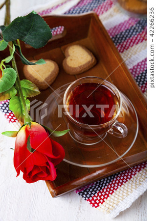 Heart-shaped biscuits, rose and tea 42266236