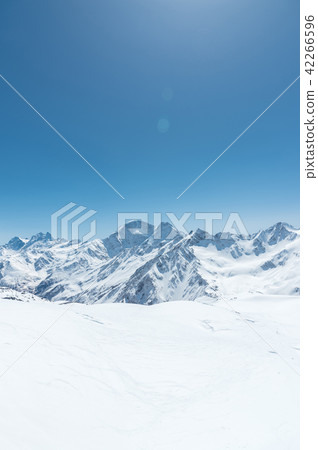Winter snow covered mountain peaks in Caucasus. Great place for winter sports 42266596