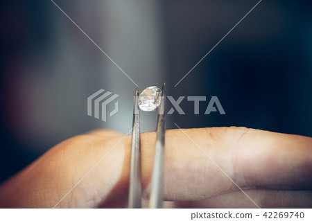 Different goldsmiths tools on the jewelry workplace. Jeweler at work in jewelry. Different goldsmiths tools on the jewelry workplace. Jeweler at work in jewelry. 42269740