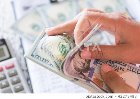 Close up woman hands counting America dollar 42275488