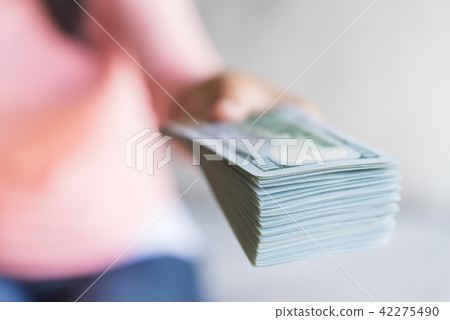 woman hands proposing money us dollar 42275490