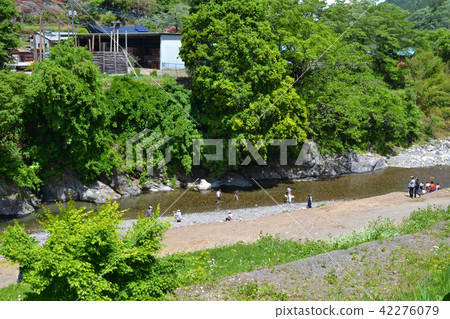 Walking in the river at the river in front of Michi no Road Station 42276079