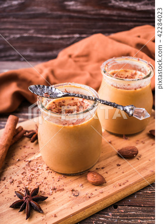 Toffee caramel dessert in jar 42284023