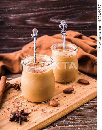 Toffee caramel dessert in jar 42284027