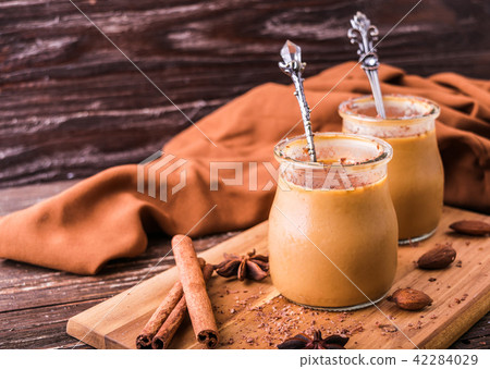 Toffee caramel dessert in jar 42284029