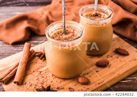 Toffee caramel dessert in jar 42284032