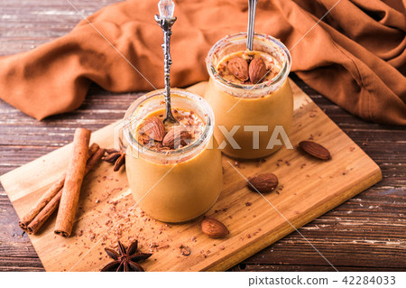 Toffee caramel dessert in jar 42284033