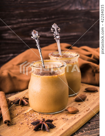 Toffee caramel dessert in jar 42284035