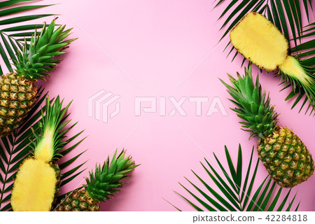 Half slice of fresh pineapple and whole fruit Half slice of fresh pineapple and whole fruit 42284818