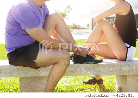 Athlete man and woman in the park Athlete man and woman in the park 42285033