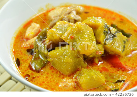 spicy boiled pumpkin with chicken in curry on bowl spicy boiled pumpkin with chicken in curry on bowl 42286726