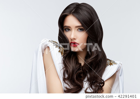 Brunette asian girl with long curly hair 42291401