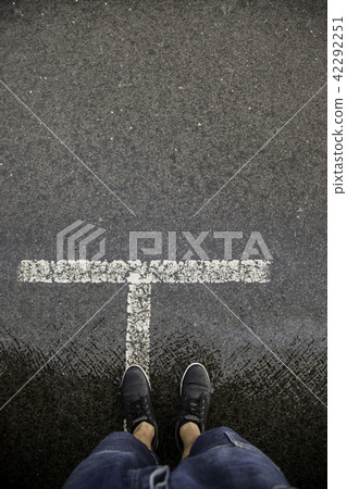 Feet on wet asphalt Feet on wet asphalt 42292251