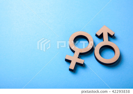 Gender symbols of man and woman of tree on blue Gender symbols of man and woman of tree on blue 42293838