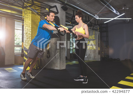 Cheerful man and serious man in gym 42294877