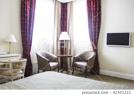 The interior of room in calm colours, sitting area The interior of room in calm colours, sitting area 42301222
