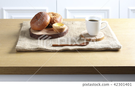 Breakfast prepared with bread and coffee Breakfast prepared with bread and coffee 42301401
