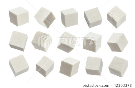 Greek feta cubes. Diced soft cheese isolated on white background Greek feta cubes. Diced soft cheese isolated on white background 42303378