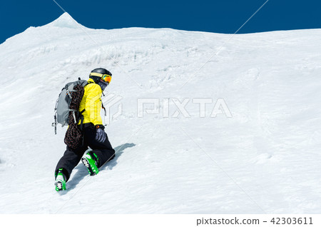Winter snow covered mountain peaks in Caucasus. Great place for winter sports 42303611