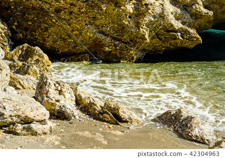 Amazing sea with blue summer wave and rocks Amazing sea with blue summer wave and rocks 42304963
