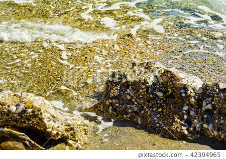 Amazing sea with blue summer wave and rocks Amazing sea with blue summer wave and rocks 42304965