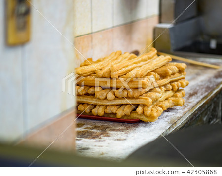Youtiao, deep-fried dough stick Youtiao, deep-fried dough stick 42305868