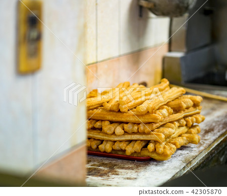 Youtiao, deep-fried dough stick Youtiao, deep-fried dough stick 42305870