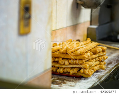 Youtiao, deep-fried dough stick Youtiao, deep-fried dough stick 42305871