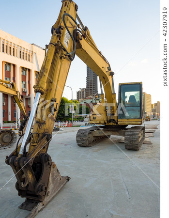 excavator on ground at day excavator on ground at day 42307919