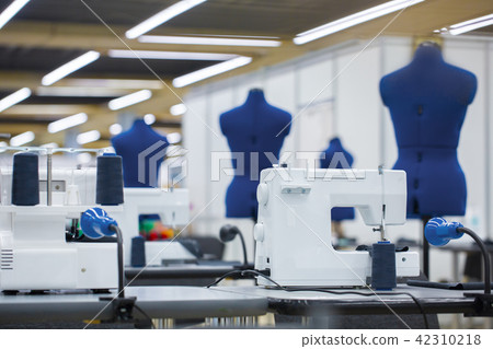 Interior of garment factory. Tailoring industry, fashion designer workshop, industry concept 42310218
