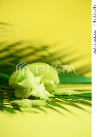 Exotic star fruit or averrhoa carambola over 42310248