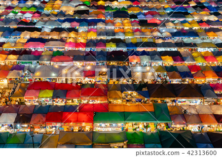 Aerial view multiple colour roof top flea market 42313600