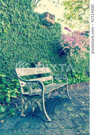 White chair in the park retro stye White chair in the park retro stye 42314880