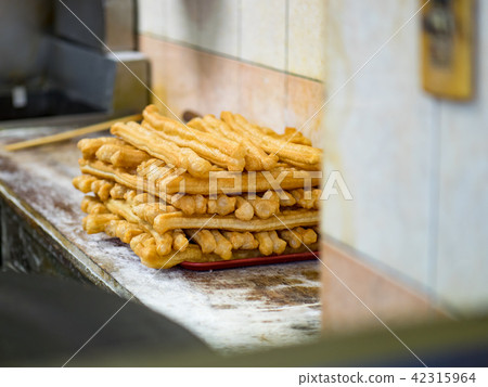 Youtiao, deep-fried dough stick  42315964
