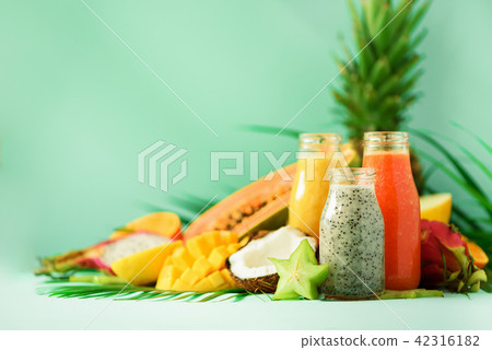 Papaya, dragon fruit, pineapple, mango smoothie in 42316182
