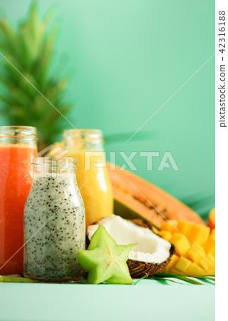 Papaya, dragon fruit, pineapple, mango smoothie in 42316188