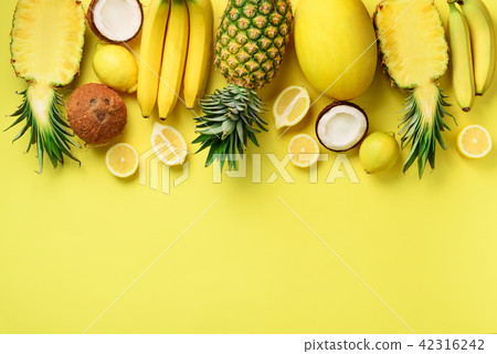 Fresh organic yellow fruits over sunny background 42316242
