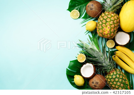 Exotic pineapples, ripe coconuts, banana, melon Exotic pineapples, ripe coconuts, banana, melon 42317105