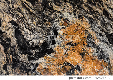 Close up of granite texture, black and brown color, precious sto 42321699