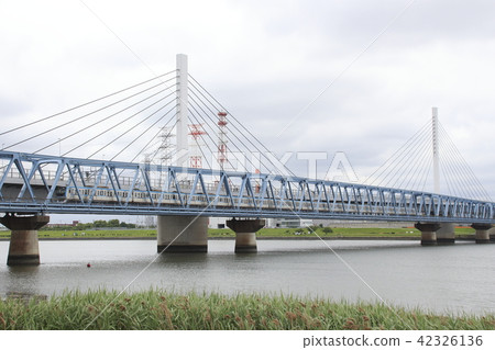 Subway Tozai line 15000 series crossing the Arakawa bridge 42326136