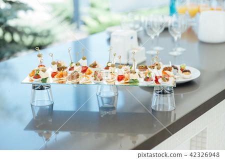 Snacks, fish and meat specialities on the buffet. Snacks, fish and meat specialities on the buffet. 42326948