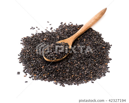 Black sesame seeds on wood spoon with white  42327194