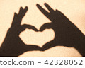 Black silhouette on white sand, Love and my heart  42328052
