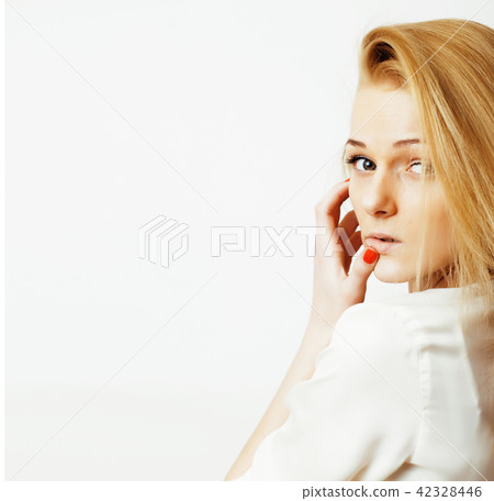 young blond woman on white backgroung gesture thumbs up, isolate 42328446