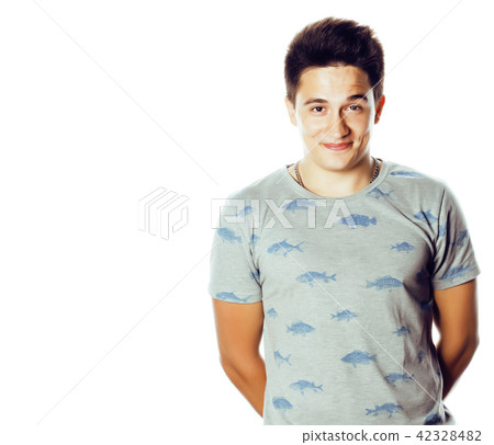 young handsome teenage hipster guy posing emotional, happy smili 42328482