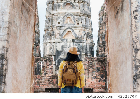Asian tourist take a photo of ancient of pagoda Asian tourist take a photo of ancient of pagoda 42329707