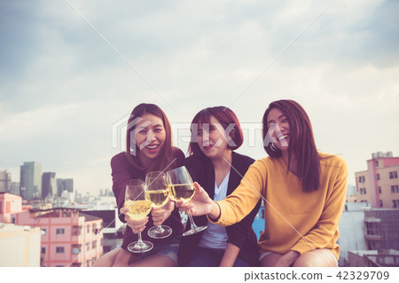 Happy group of asian girl friends enjoy laughing Happy group of asian girl friends enjoy laughing 42329709
